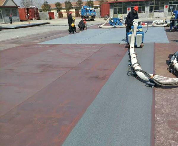 圖二，路面拋丸機(jī)清理大型鋼板